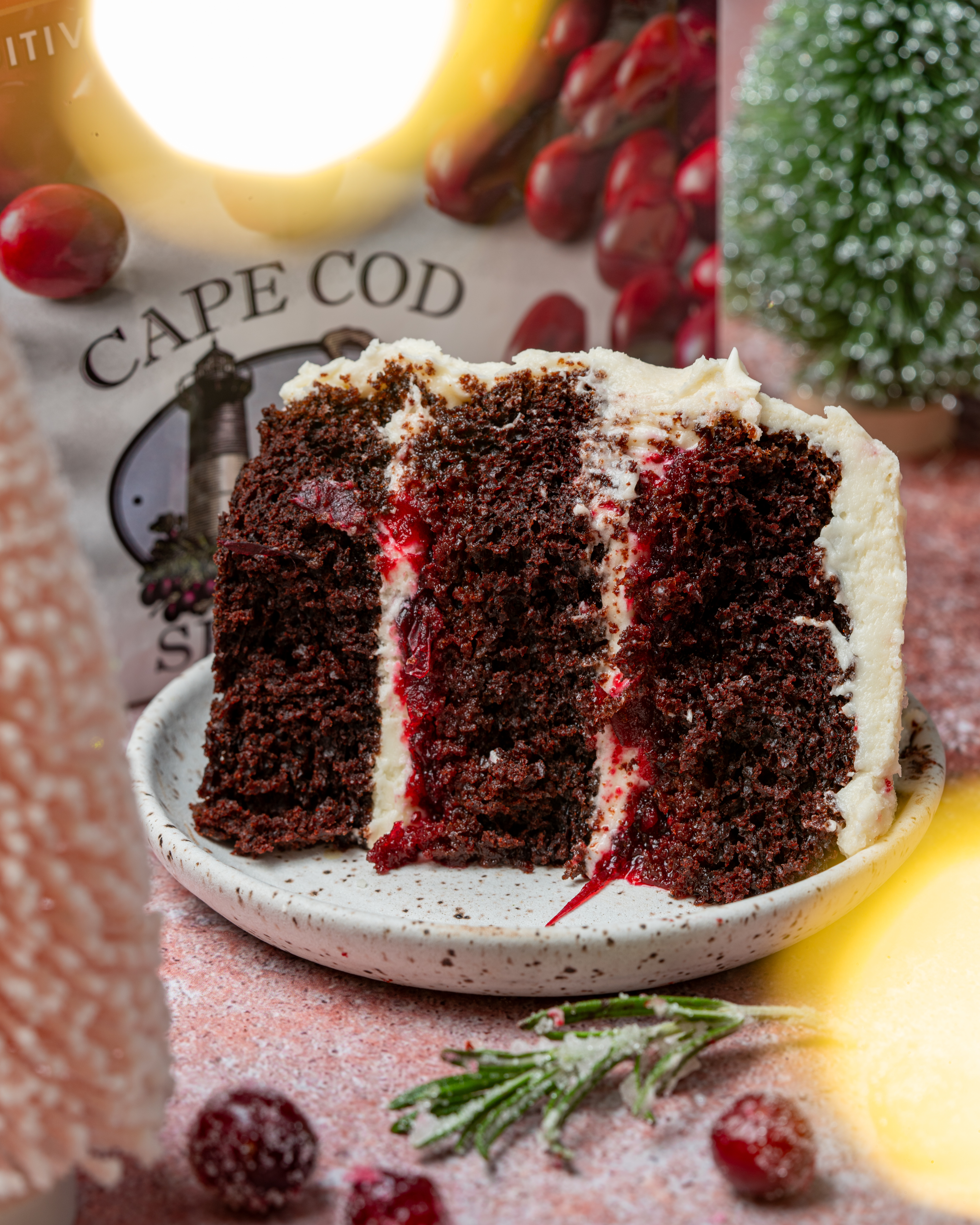 Super-moist, rich chocolate cake with Cape Cod Select frozen cranberries, a deep cocoa flavor, and layered with a tangy cream cheese frosting.